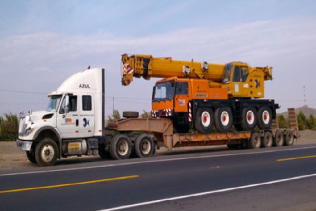 como realizar transporte maquinaria pesada